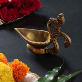 Badaami Diya with Peacock Handle