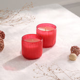 Apple cinnamon scented glass candles styled for cosy home decor and festive table settings