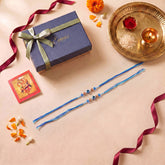Handmade Evil Eye Rakhi for Brothers Set of 2, beautifully presented in a festive gift box for Raksha Bandhan gifting.