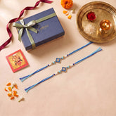 Handmade Metal Floral Rakhi for Brothers (Set of 2), beautifully presented in a festive gift box, ready for Raksha Bandhan gifting.