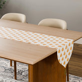 Marigold Buta Chanderi table runner styled on a 4 to 6-seater dining table for everyday and festive dining