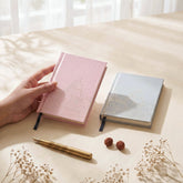Handmade pocket notebook on an office desk for note taking, planning, journaling &writing