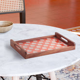 Rectangular sheesham wood serving tray with orange chanderi fabric and golden paisley motifs, styled for festive serving and home décor