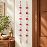Pink floral hanging styled as festive entrance door décor