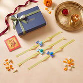 Set of 3 Giraffe Wooden Kids Rakhi, packed in a yellow ribbon gift box for Raksha Bandhan gifting.