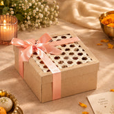 A premium square keepsake box topped with a light-grain natural bamboo lid sits on a festive table holding knick-knacks.
