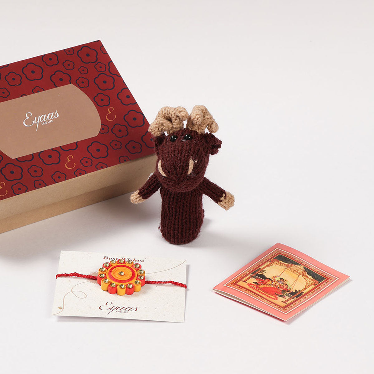 1 Quilled Rakhi, Crochet Toy & Roli Tika Gift Set, Flower