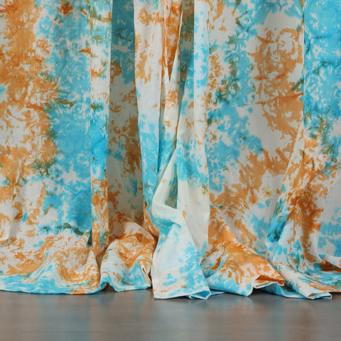 Blue & Orange tie-dye mulmul cotton window curtain. Soft, breezy cotton curtains for windows and doors with a handcrafted tie-dye design.