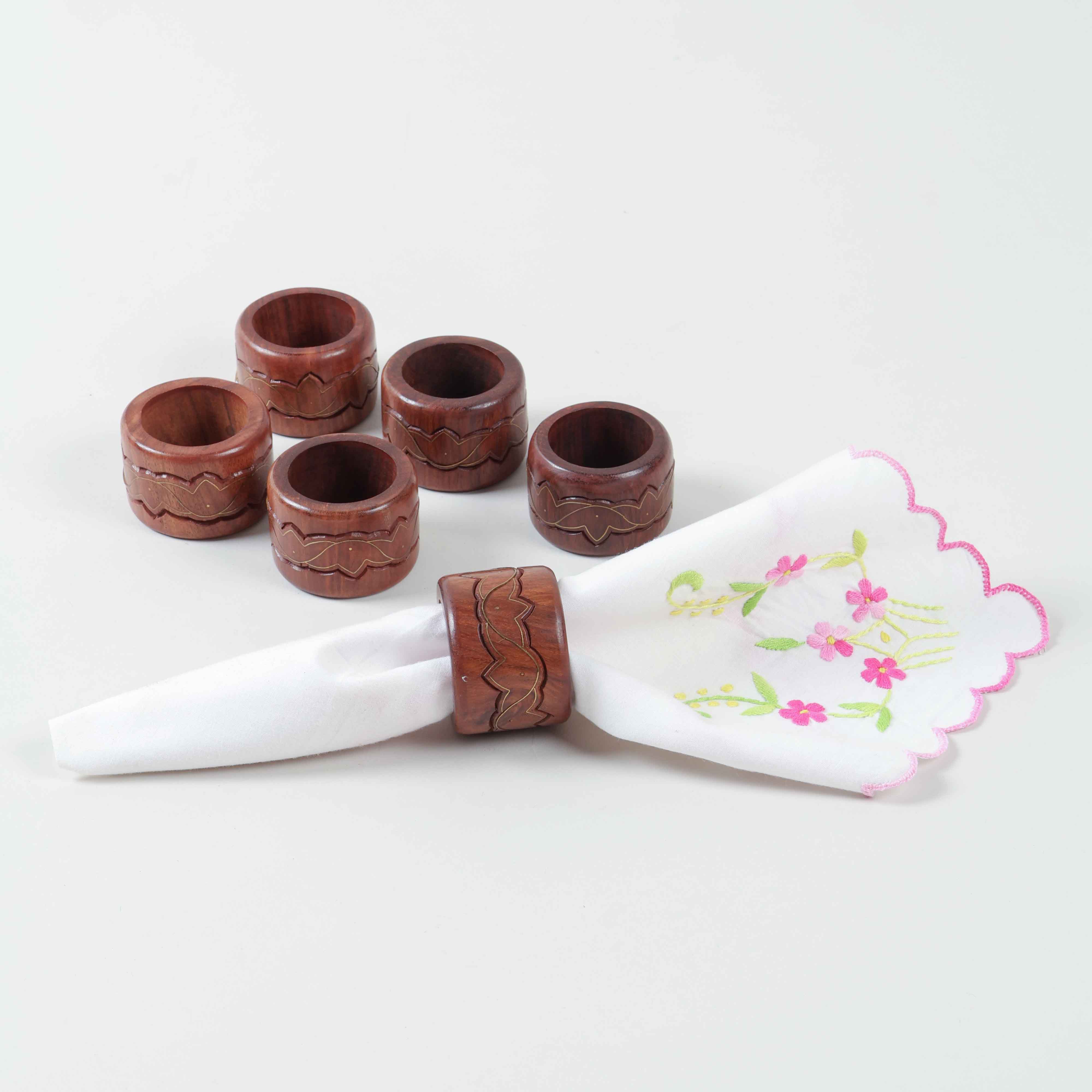 Decorative set of 6 round wooden napkin rings featuring lotus inspired brass inlay for dining table arrangements