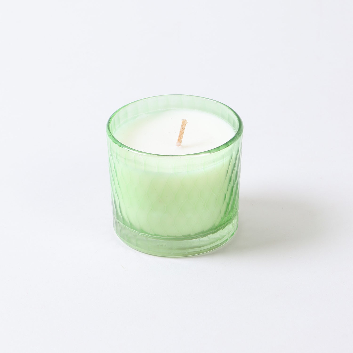 Green apple scented green votive candles crafted with soy wax for clean burning