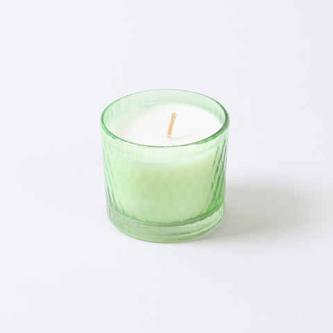 Green apple scented green votive candles crafted with soy wax for clean burning