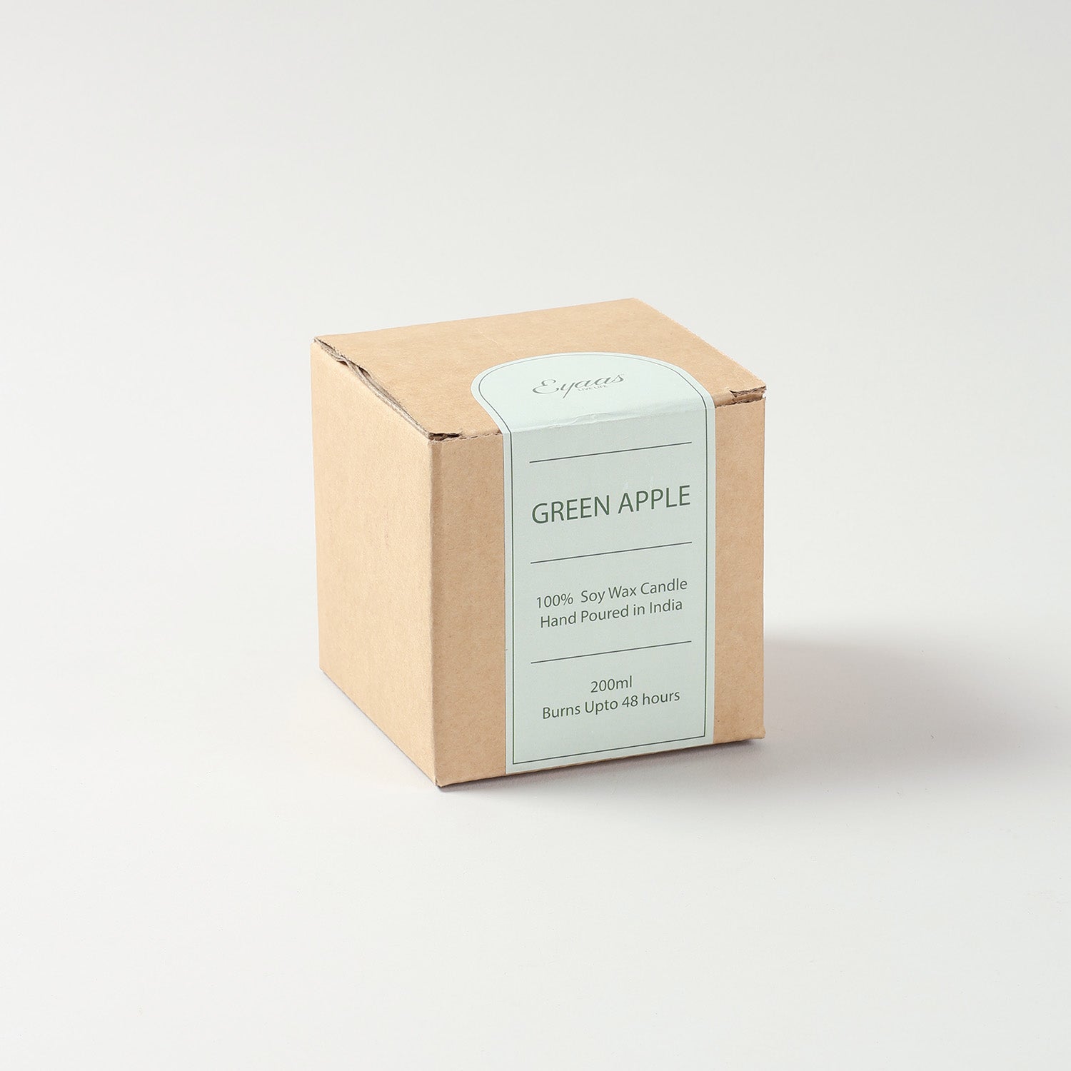 Green glass scented candle with gift box packaging ideal for housewarming and festive gifts