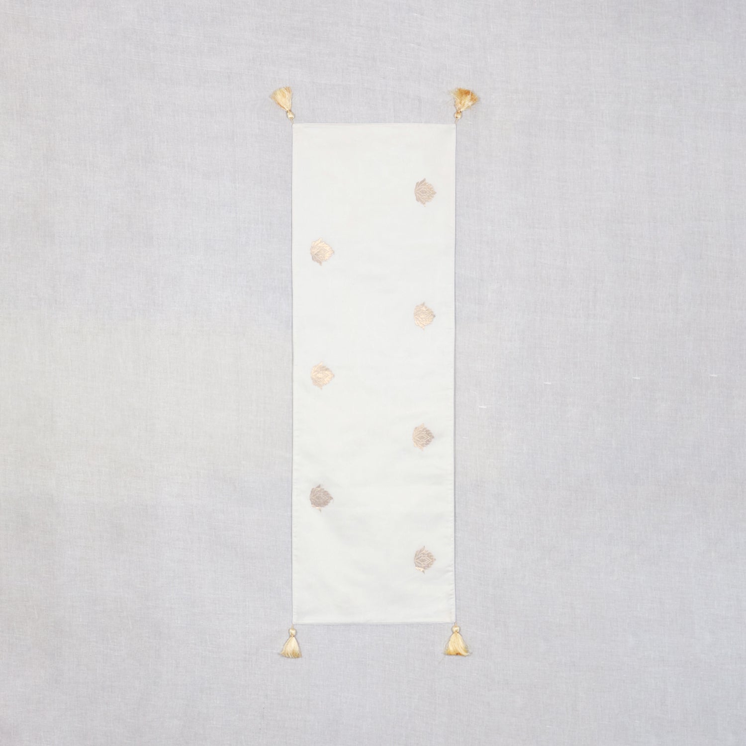 White Chanderi Handwoven Table Runner with Golden Motifs