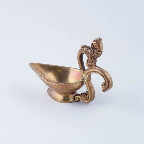 Badaami Diya with Peacock Handle