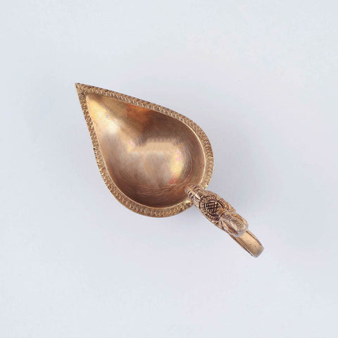 Badaami Diya with Peacock Handle