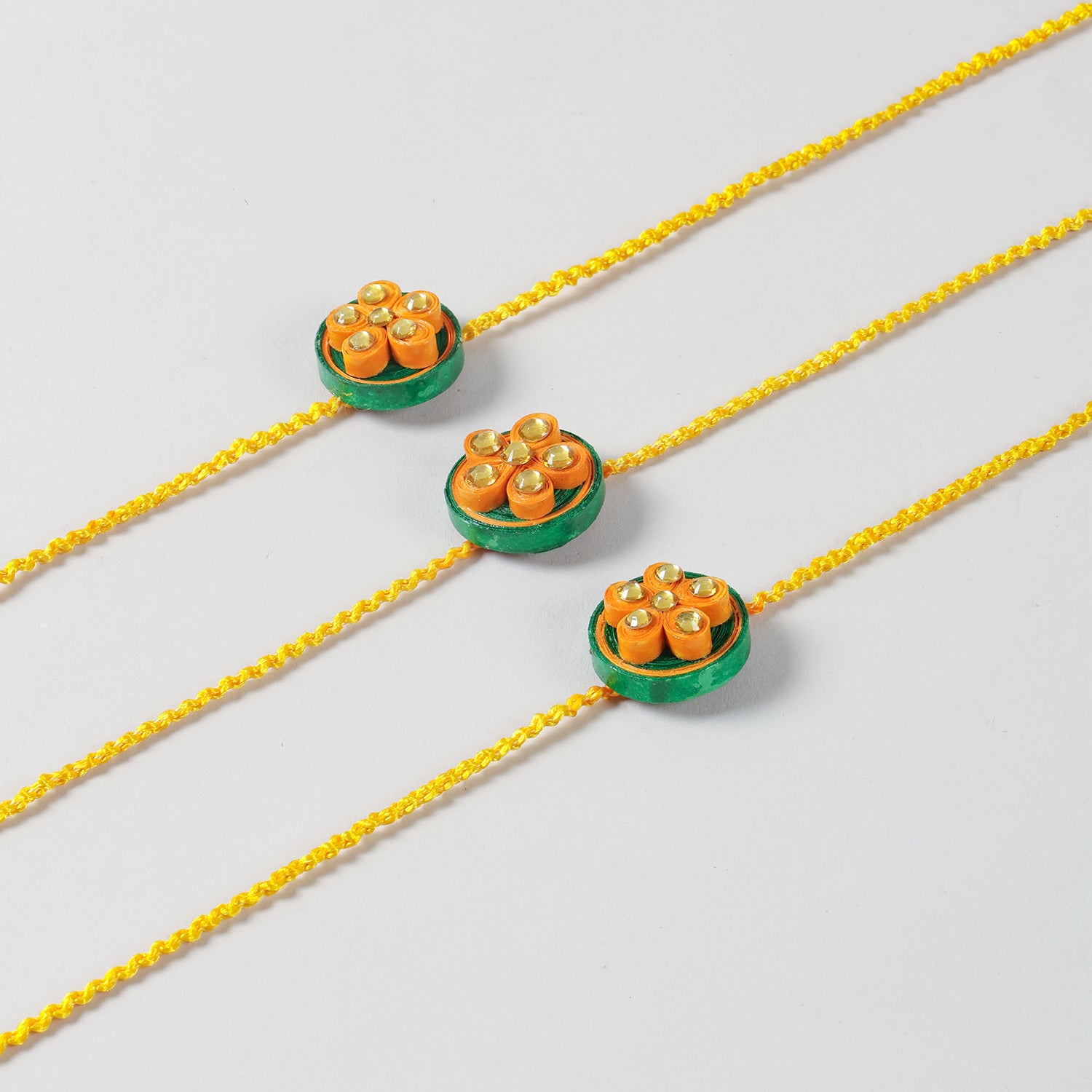 Handmade Floral Paper Quilled Rakhi (Set of 2 & 3)
