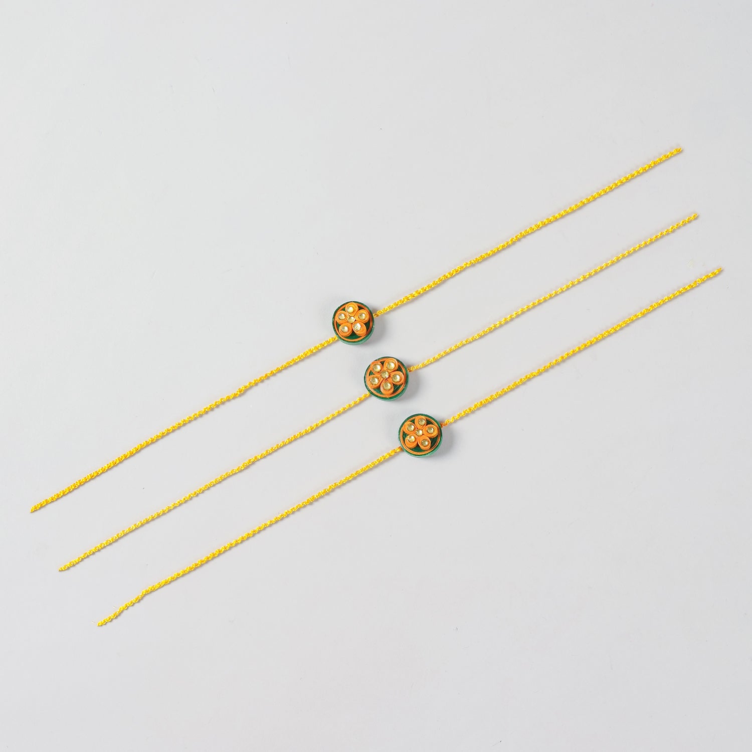 Handmade Floral Paper Quilled Rakhi (Set of 2 & 3)