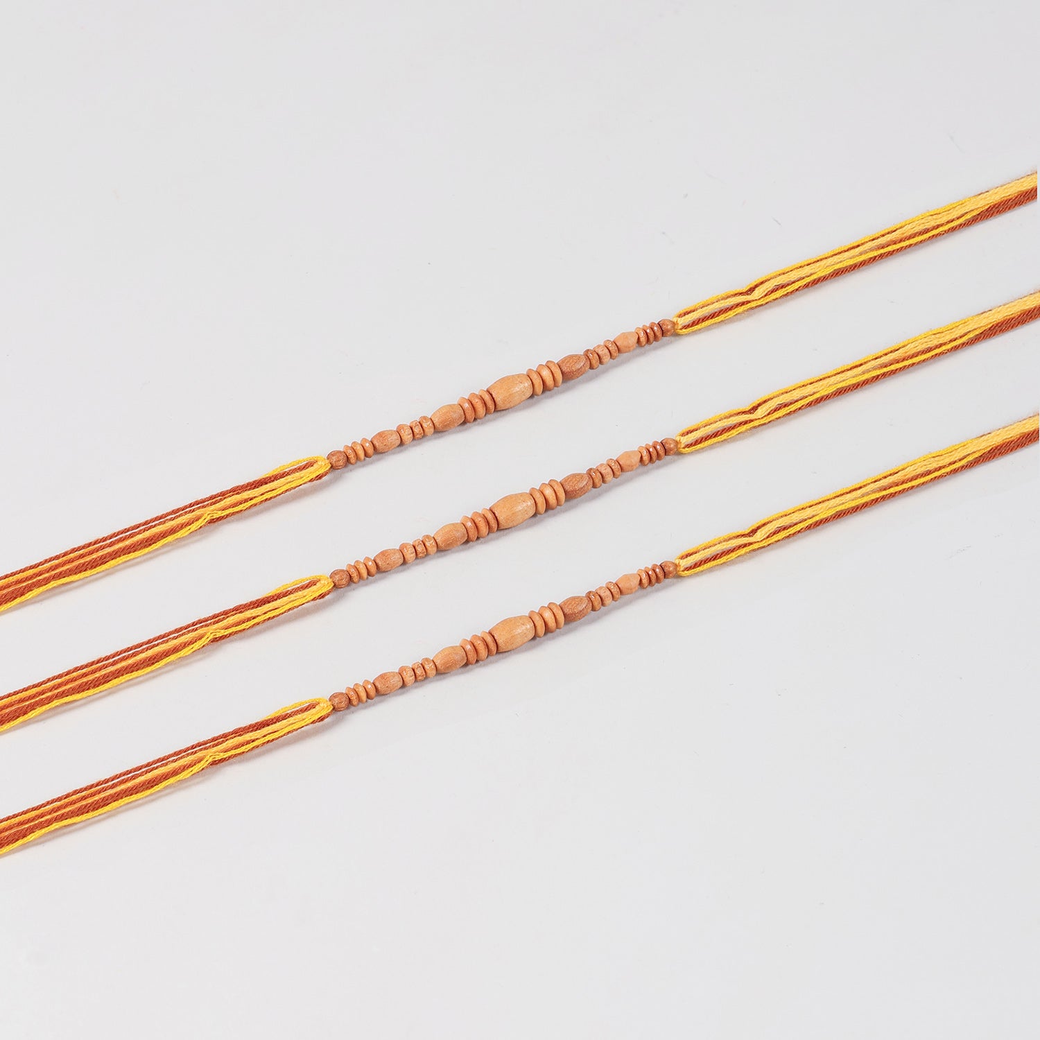 Wooden Beads Rakhi for Brothers (Set of 3 & 4)