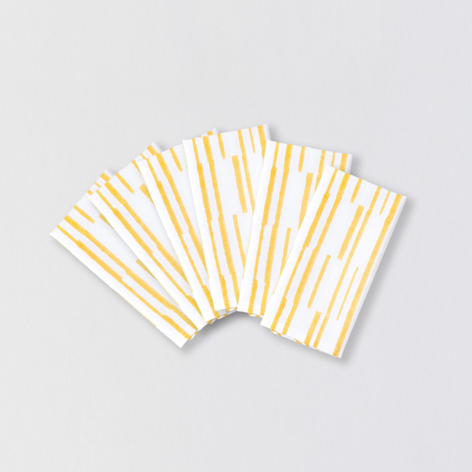 Pack of six reusable cotton dining table napkins with fresh yellow stripe detailing