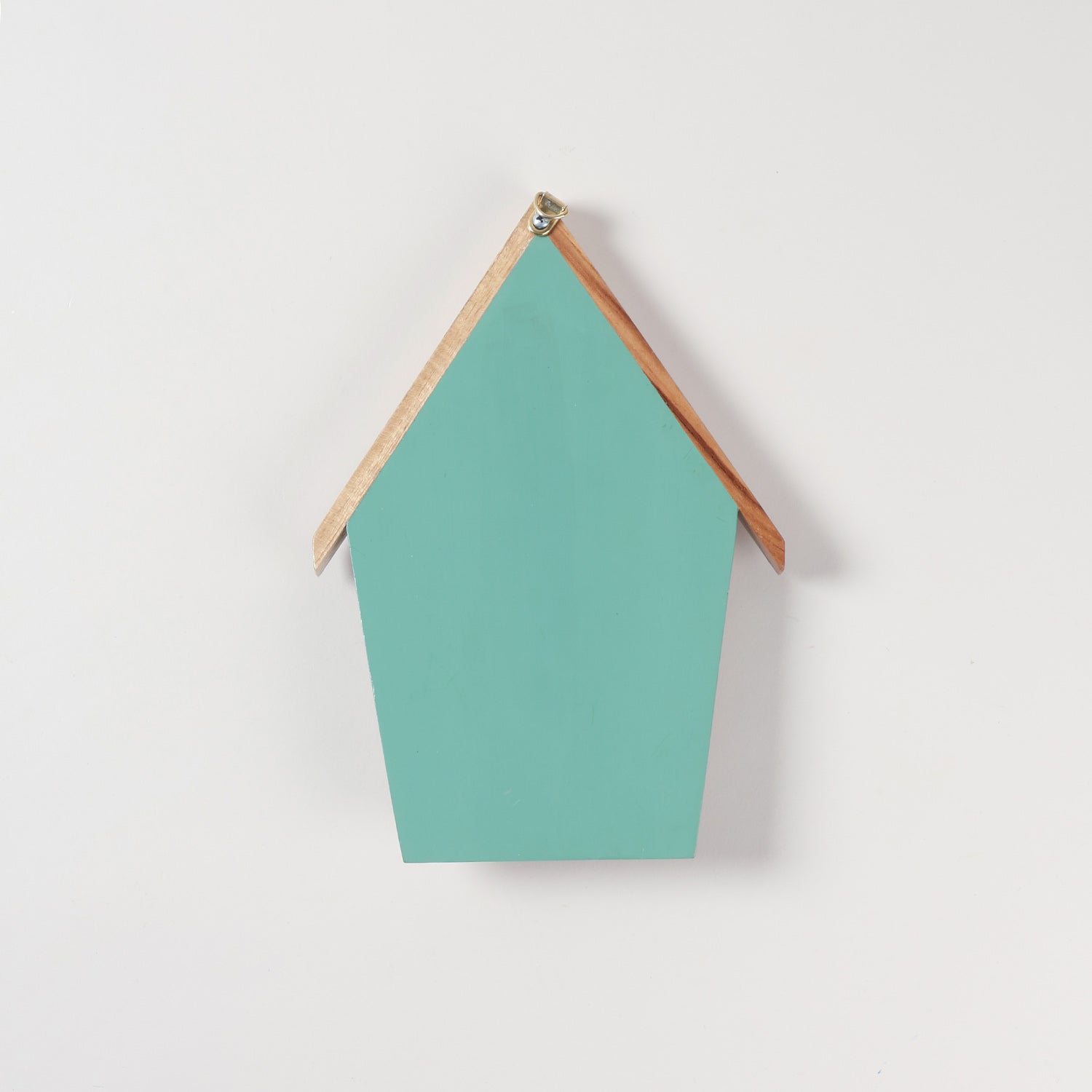 Reverse side of handmade bamboo key holder showing the back panel, hanging fixture, and wall mounting design
