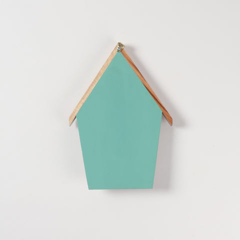 Reverse side of handmade bamboo key holder showing the back panel, hanging fixture, and wall mounting design