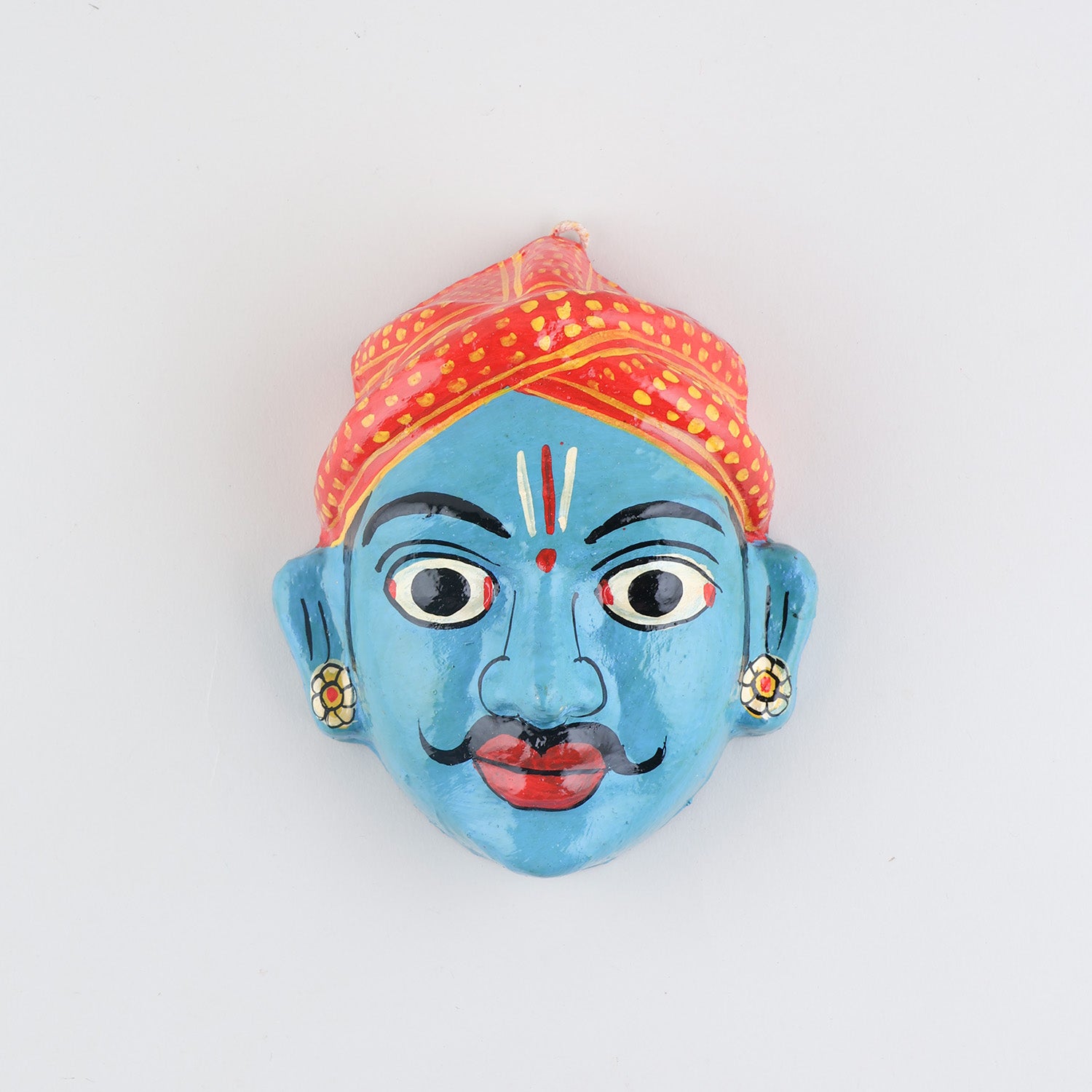  Hand-painted blue Cheriyal male mask crafted from papier-mache, showcasing traditional Telangana folk art details on a plain background