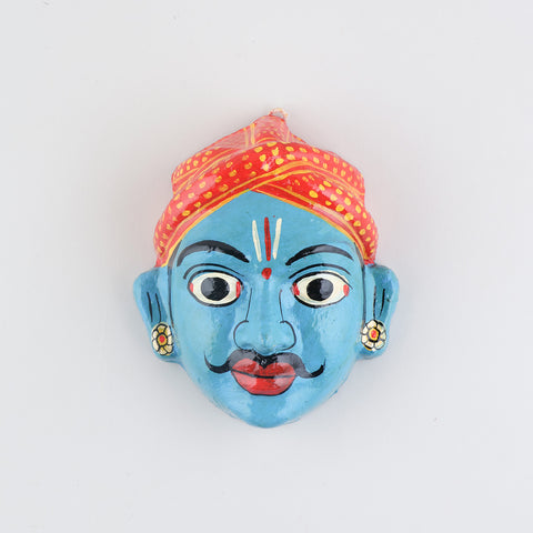  Hand-painted blue Cheriyal male mask crafted from papier-mache, showcasing traditional Telangana folk art details on a plain background
