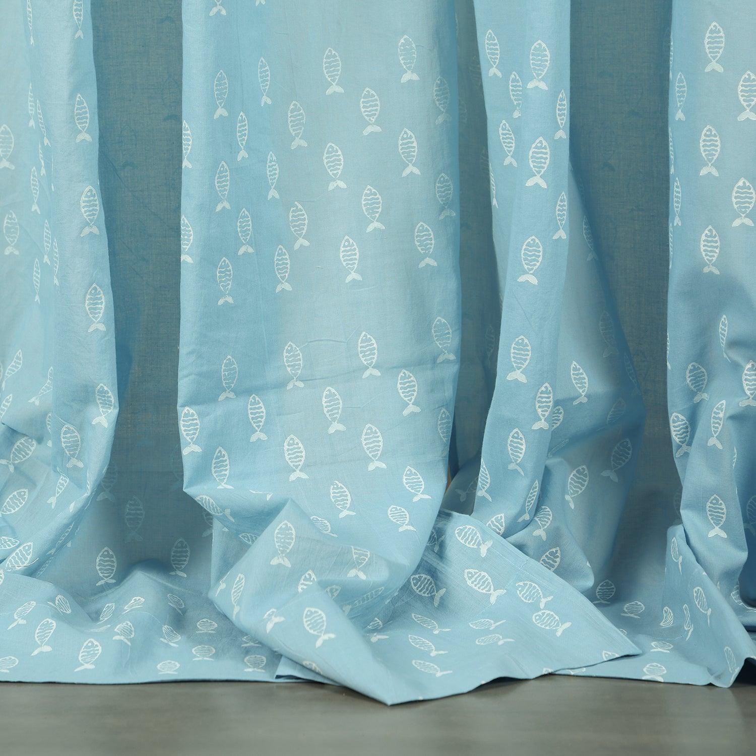 blue fish block-printed hand-dyed mulmul cotton window curtain. Soft, breathable cotton curtains for windows and doors with handcrafted detail