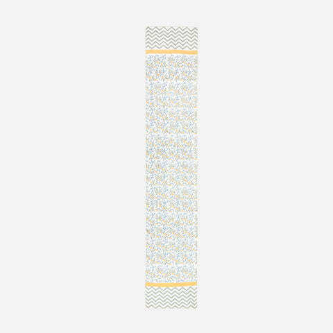 Full length cotton table runner with blue floral pattern yellow accents and decorative border design