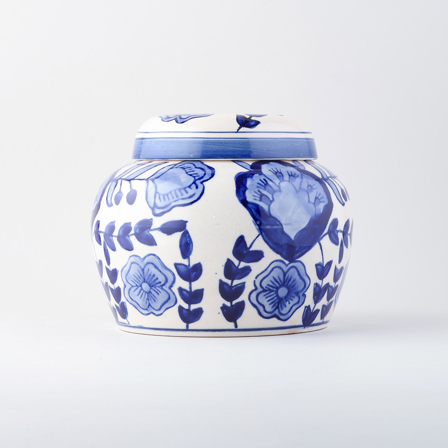 Full-size ceramic storage jar with blue floral design and lid suitable for kitchen storage and organization