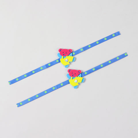 Full-length view of the blue and yellow Teddy Bear Felt Rakhi Kids Set of 2 showing the complete ribbon band and handcrafted teddy bear design.