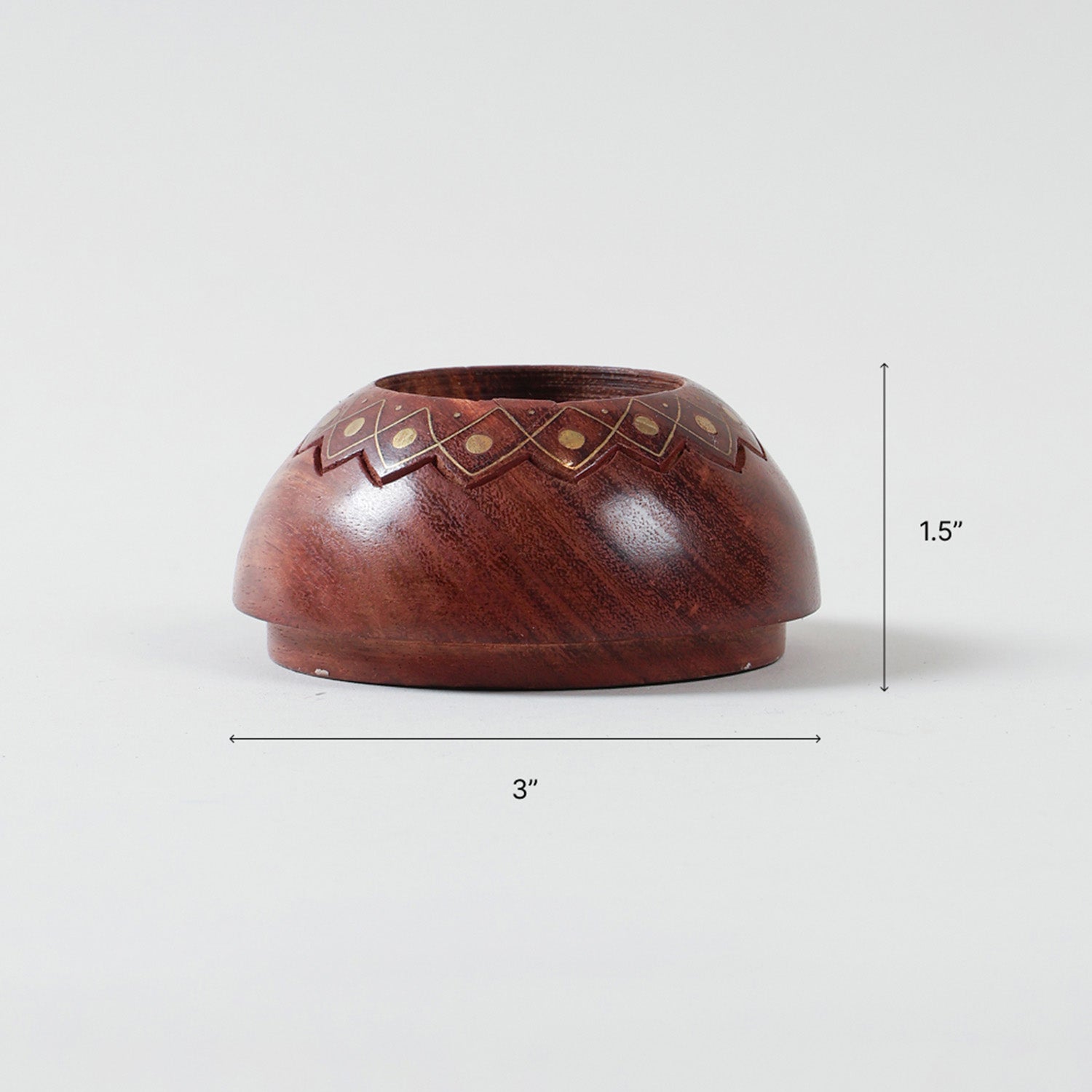 Size diagram of small brass inlay wooden T-light holder featuring a lotus motif, measuring 1.5 inches x 3 inches