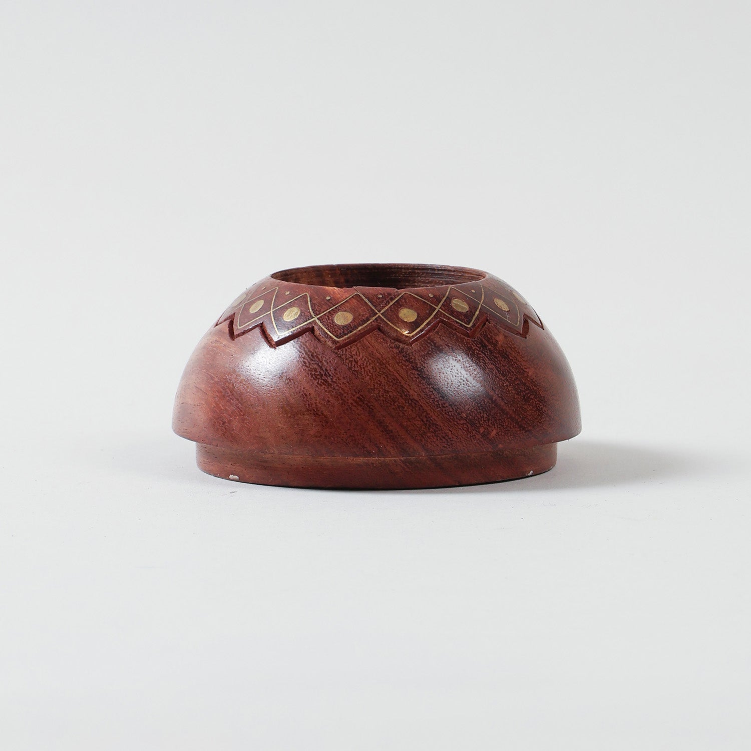Small wooden T-light holder with lotus motif and brass inlay detailing, ideal for Diwali decor and decorative candle arrangements