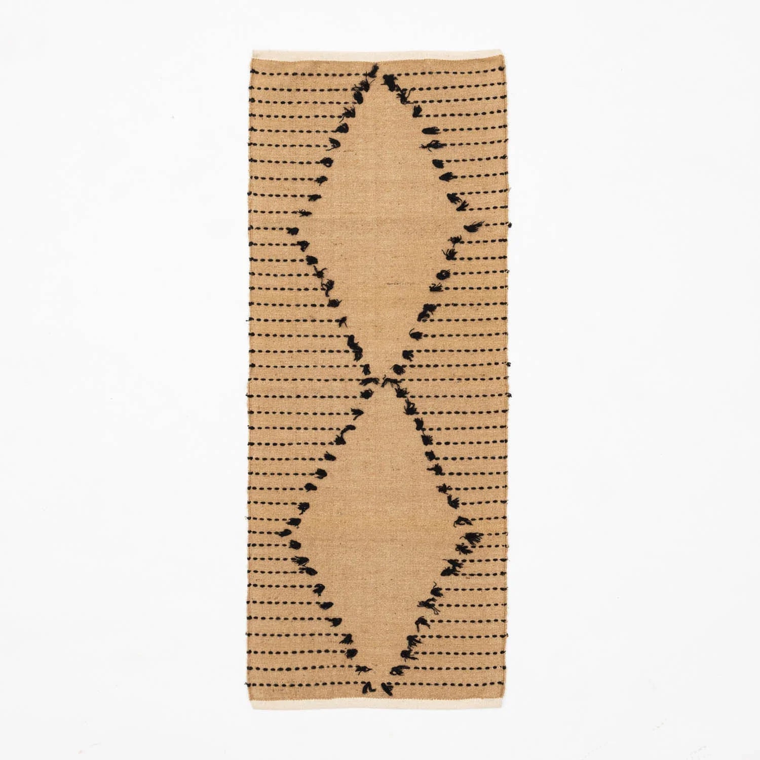 Brown hand-woven cotton dhurrie rug featuring black dotted stripe patterns across the surface
