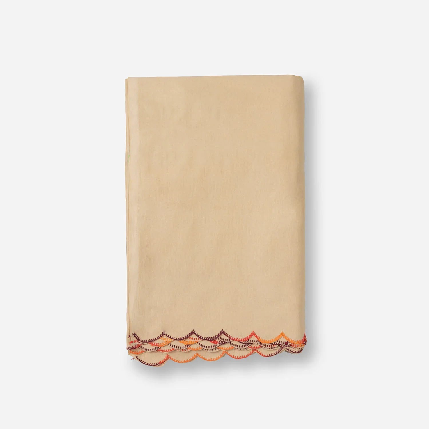Neatly folded brown cotton bedcover featuring multicoloured hand-embroidered chikankari motifs with visible fabric texture and craftsmanship