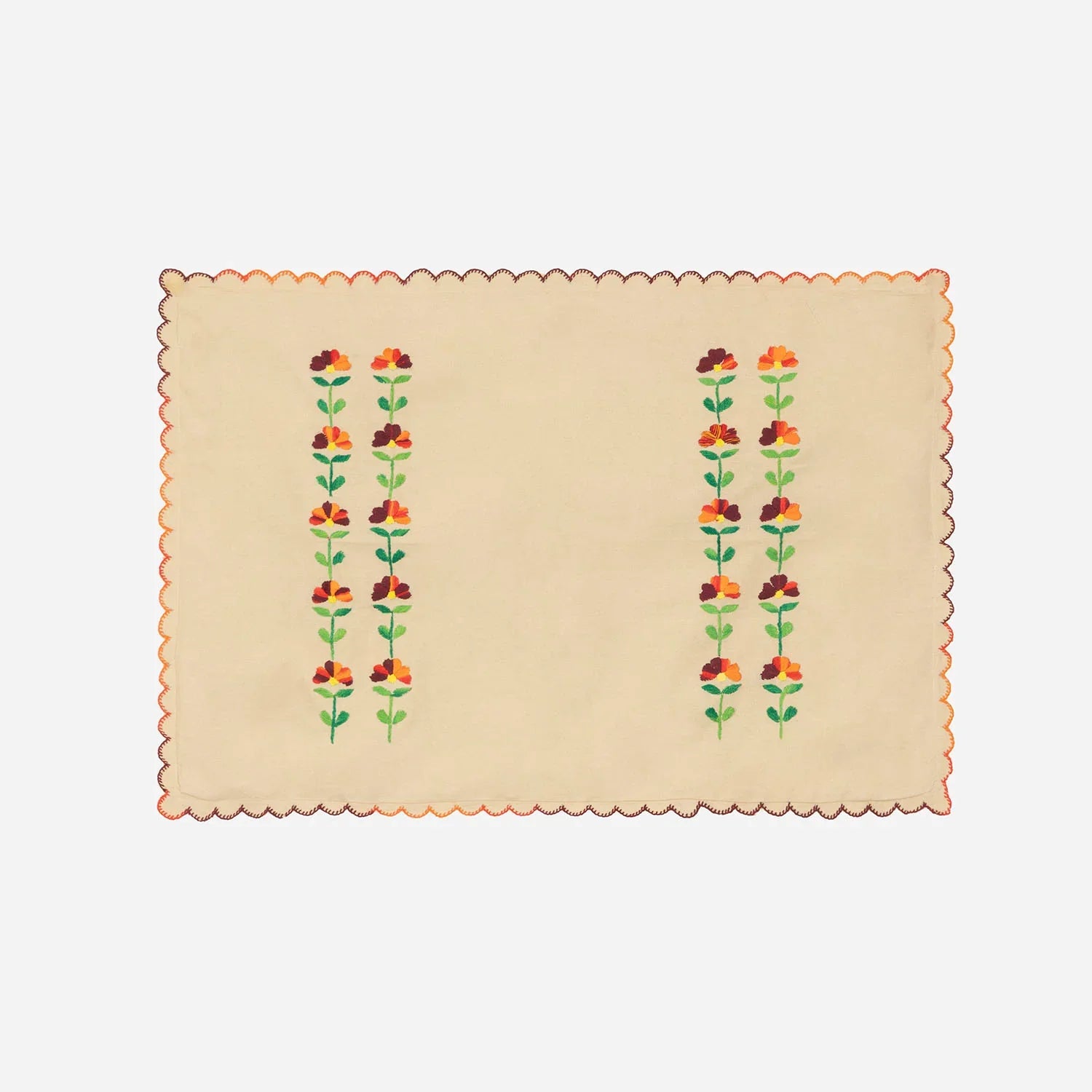 Brown cotton pillow cases featuring matching multicoloured hand-embroidered chikankari motifs