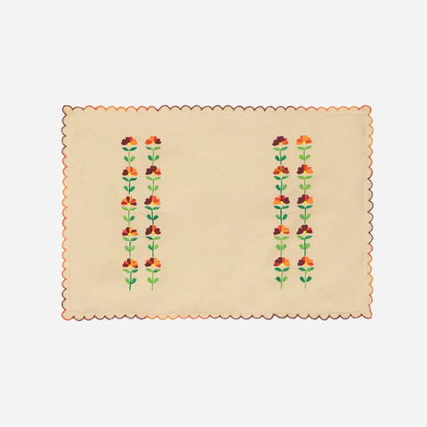 Brown cotton pillow cases featuring matching multicoloured hand-embroidered chikankari motifs
