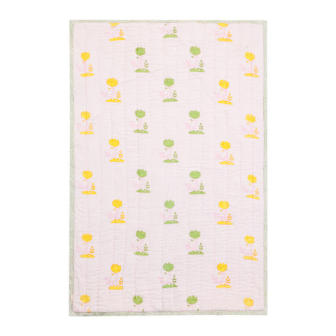 Reversible cotton quilt featuring tree patterns, designed as a lightweight quilt for all-season comfort