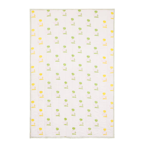 Reversible cotton quilt showcasing playful bunny and tree block printed patterns, suitable as a lightweight quilt and summer blanket