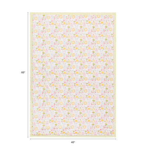 Size chart of Bunny’s Garden reversible block print quilt showing dimensions of 60 inches x 40 inches