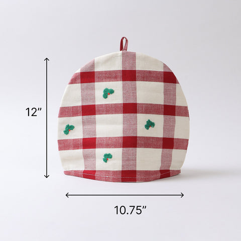 Size chart of a cotton tea cozy measuring 10.75 inches x 12 inches, designed to keep tea and coffee warm