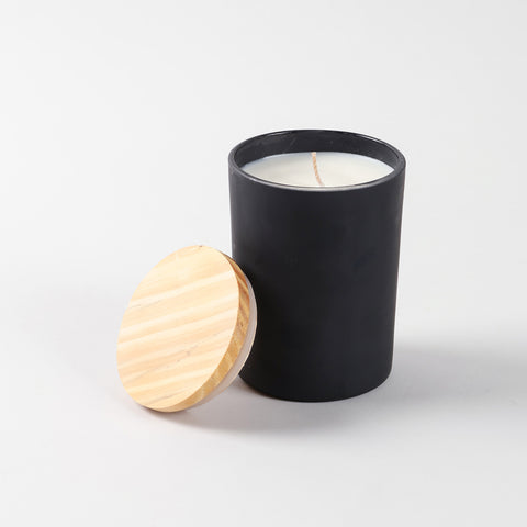 Coffee scented soy wax candle in a reusable refillable glass jar with wooden lid