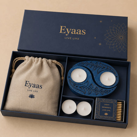 The Colour Box festive gift set with a hand-carved wooden T-light holder and colourful fabric toran