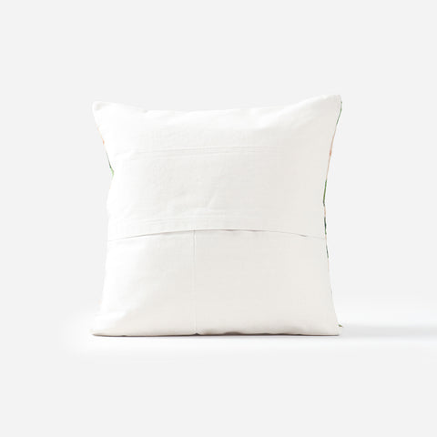 Back view of wool cushion cover featuring a zip closure and durable handcrafted construction