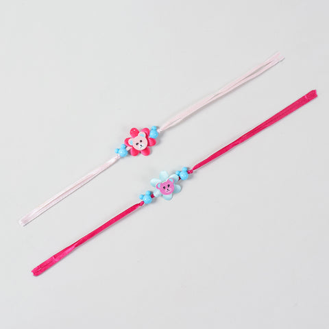 Full-length view of the Eco-friednly  Wooden Teddy Bear Kids Rakhi Set of 2 in Blue & Pink, showcasing the complete ribbon band and handcrafted teddy bear motifs