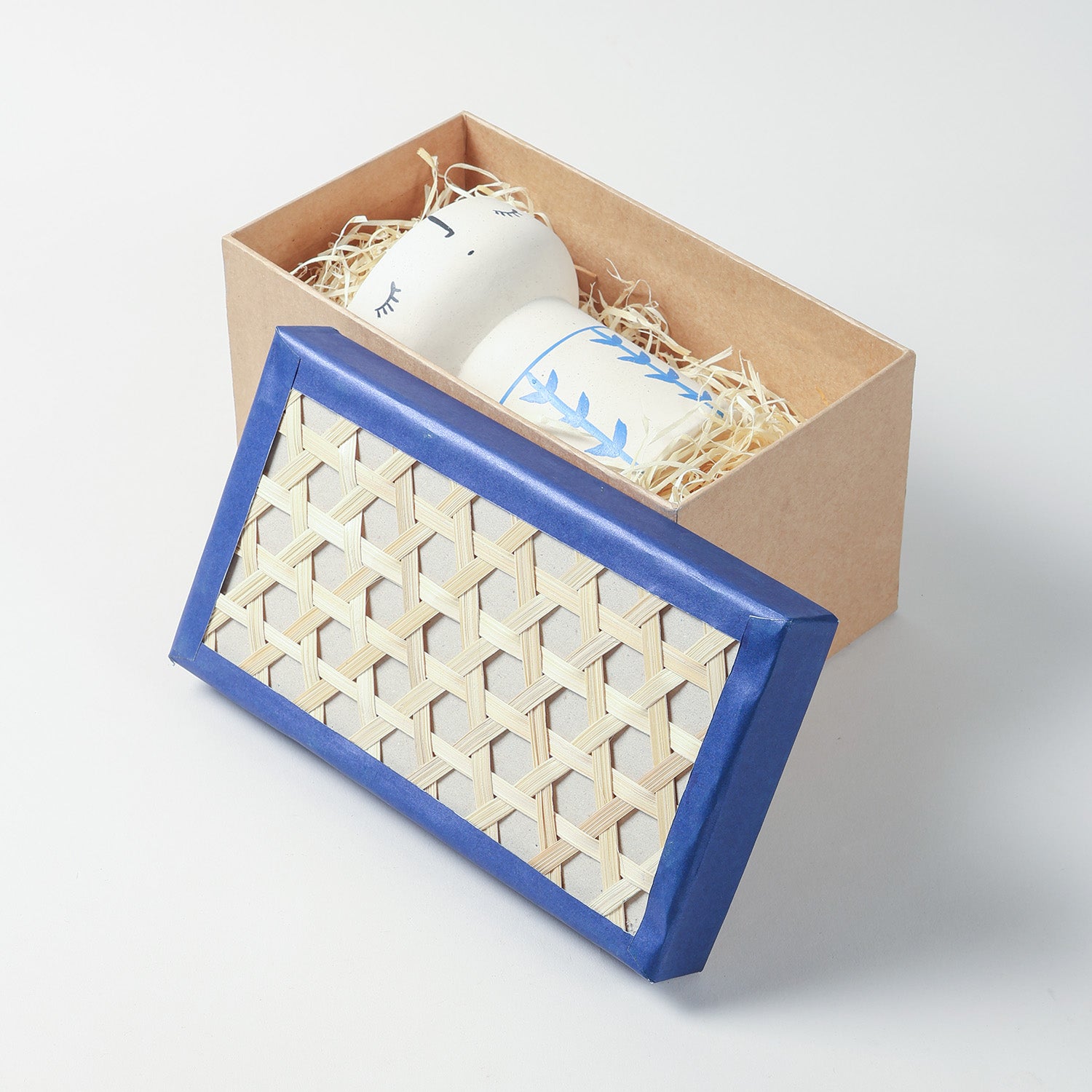 Eco-friendly rectangular bamboo-lid gift box filled with gifts for celebrations, weddings, and special occasions