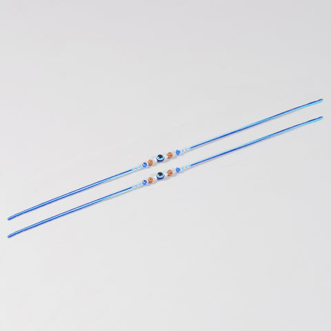 Full-length view of the Handmade Evil Eye Rakhi with Decorative Beads Set of 2, showcasing handcrafted beadwork and blue cotton thread.