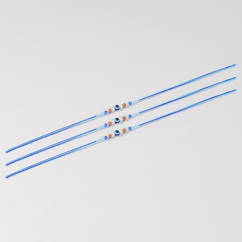 Full-length view of the Handmade Evil Eye Rakhi with Beads Set of 3, showcasing handcrafted beadwork and blue cotton thread.