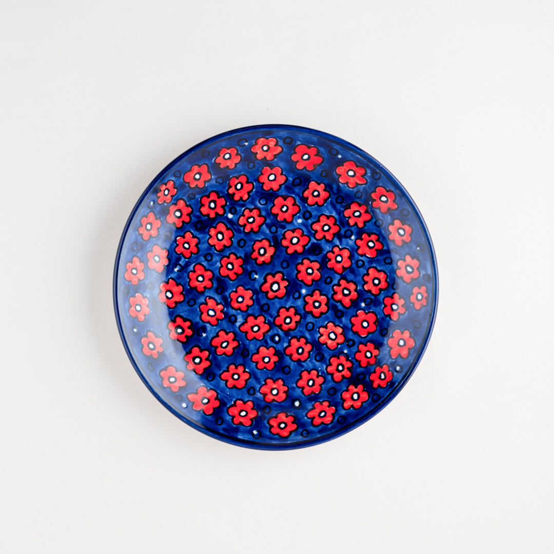 Hand-painted floral ceramic breakfast plate with blue and red accents, perfect for serving breakfast and enhancing table settings