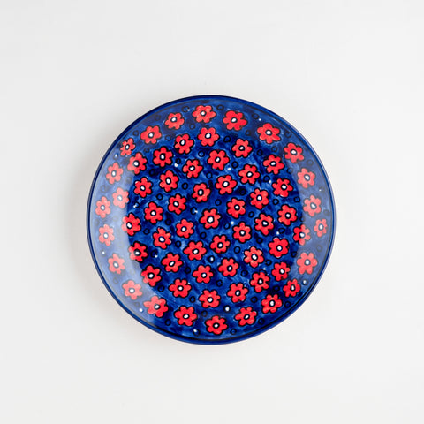 Hand-painted floral ceramic breakfast plate with blue and red accents, perfect for serving breakfast and enhancing table settings